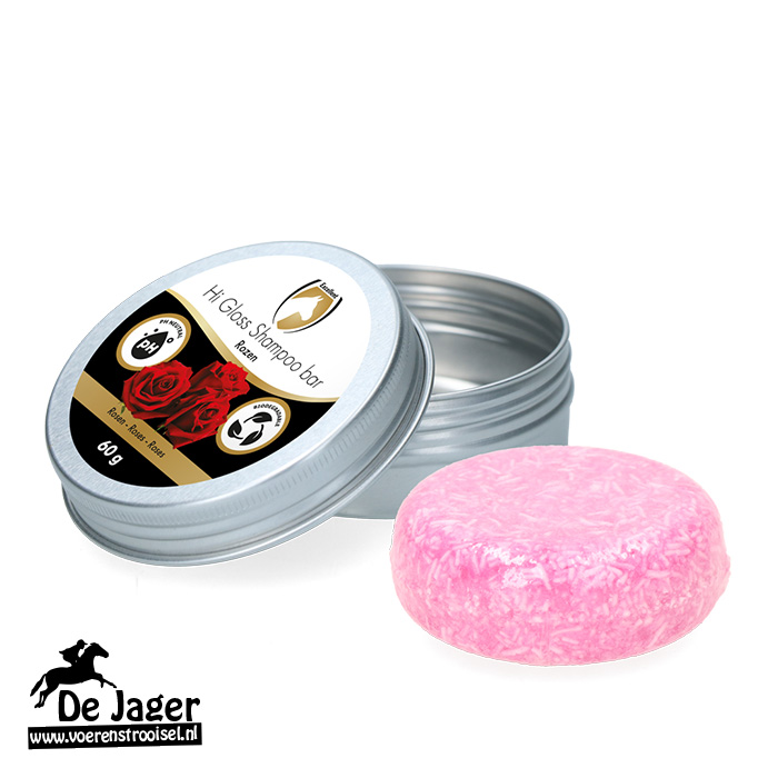 Metal tin labeled Hi Gloss Shampoo Bar with a pink round shampoo bar beside it; De Jaer logo in corner and roses on the label.